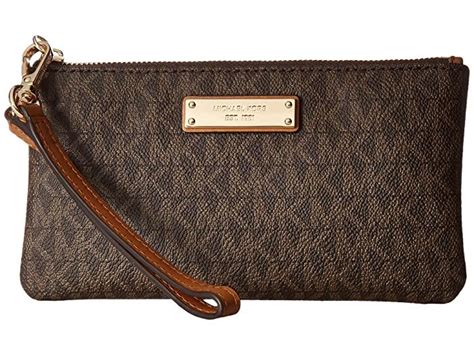 michael kors brown leather wristlet|michael kors slim wallet black.